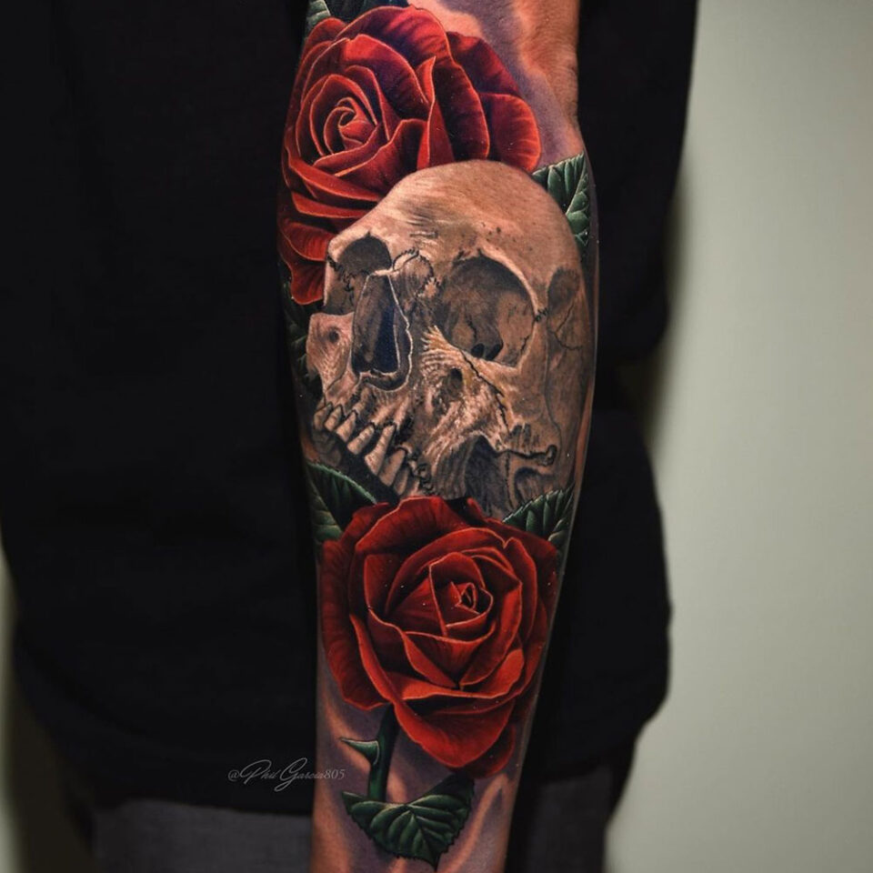 Skull with rose floral tattoo sourced via IG @philgarcia805