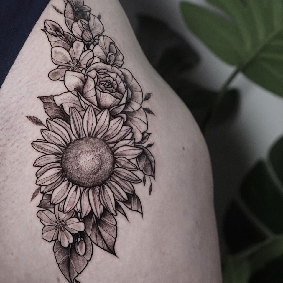 Sunflower floral tattoo sourced via IG @anniem_tattoo