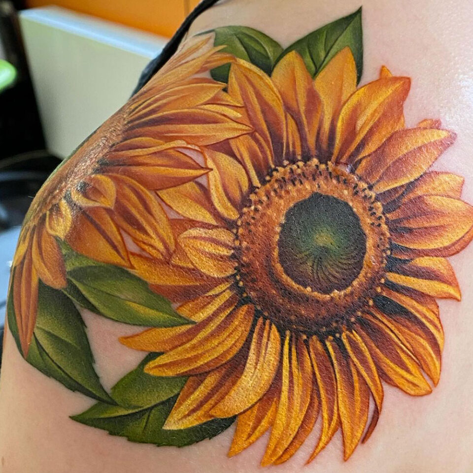 Sunflower floral tattoo sourced via IG @michellemaddison