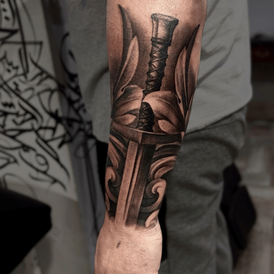 Sword Forearm Tattoos Source @alisalehtattoos via Instagram