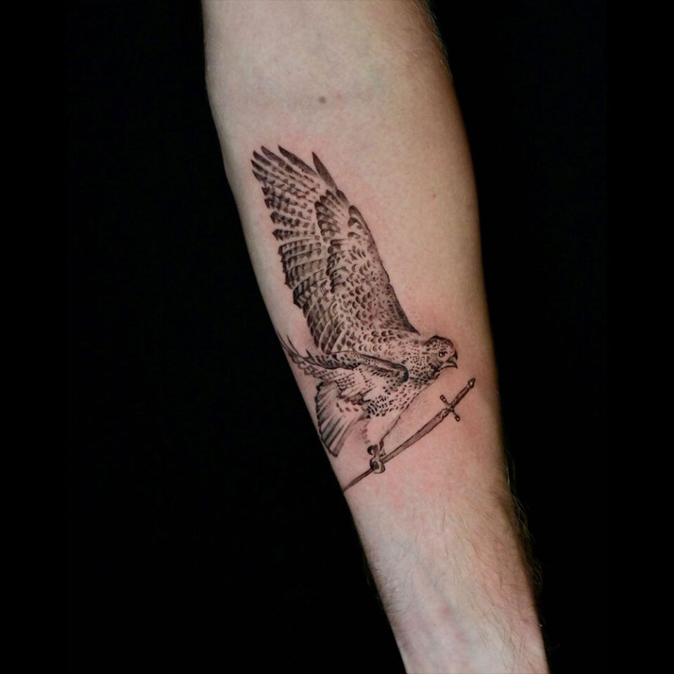 Sword and Bird Tattoo Source @customgraves via Instagram