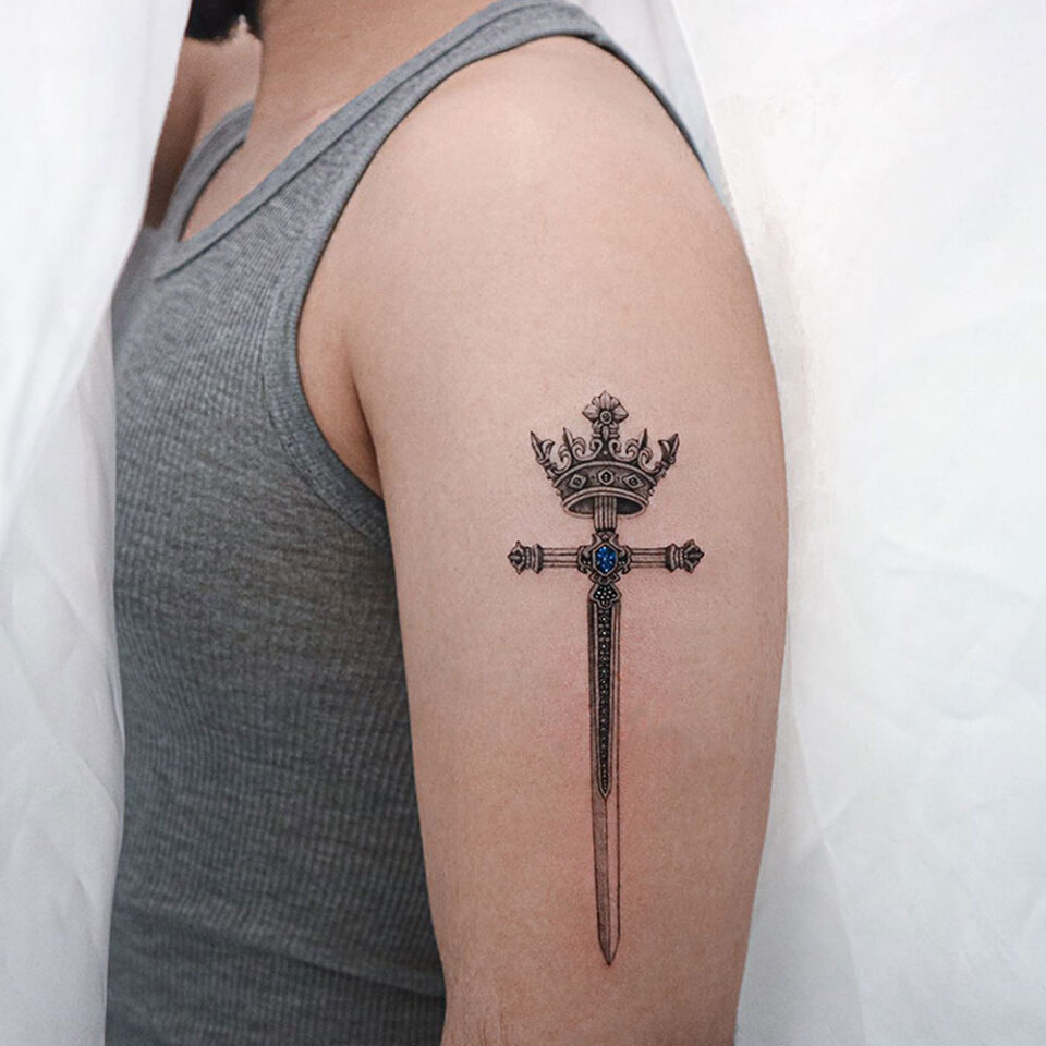 Sword and Crown Tattoo Source @xenaink via Instagram
