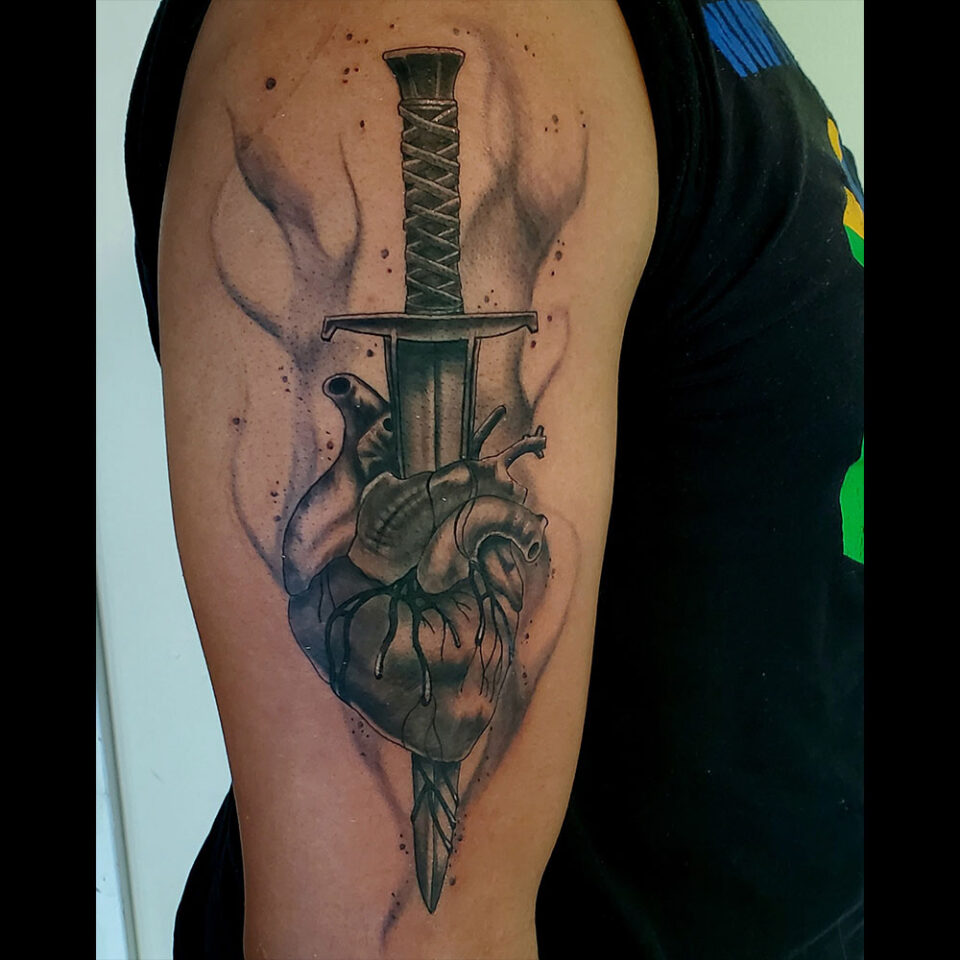 Sword and Heart Tattoo Source @billysmokez via Instagram