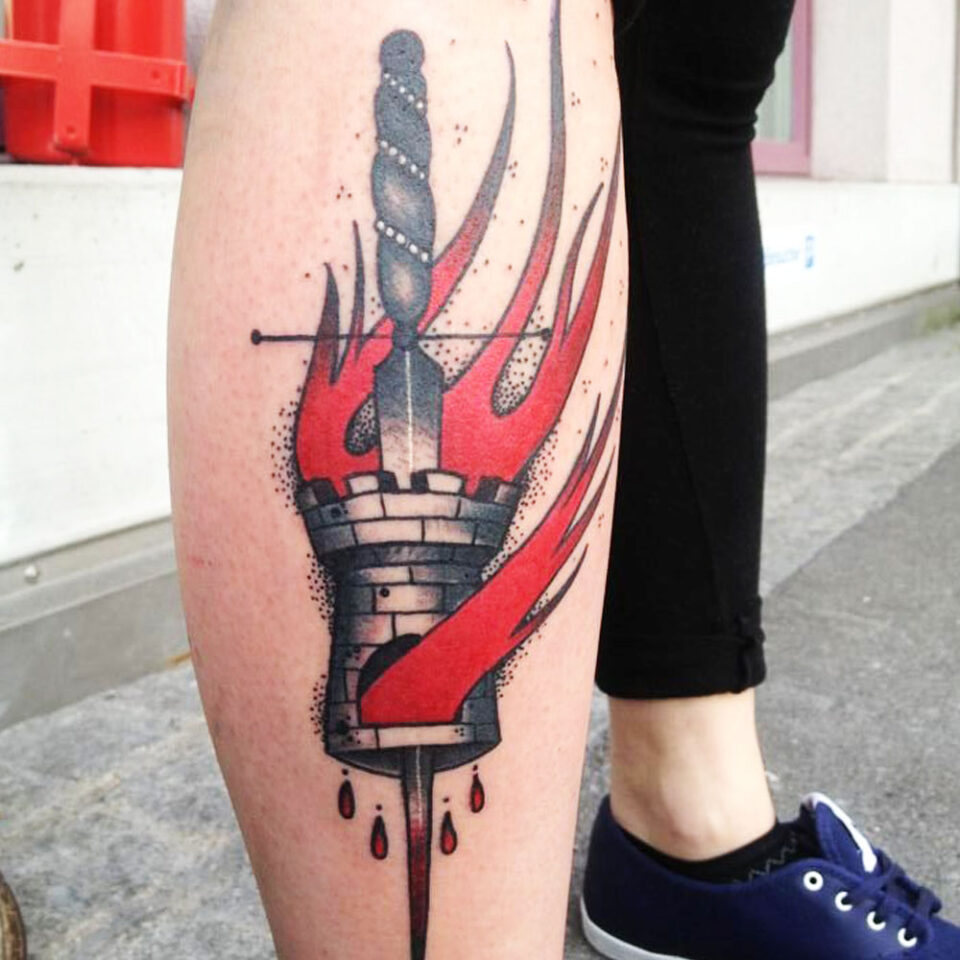 Sword and castle tattoo Source @niculintattoo via Instagram