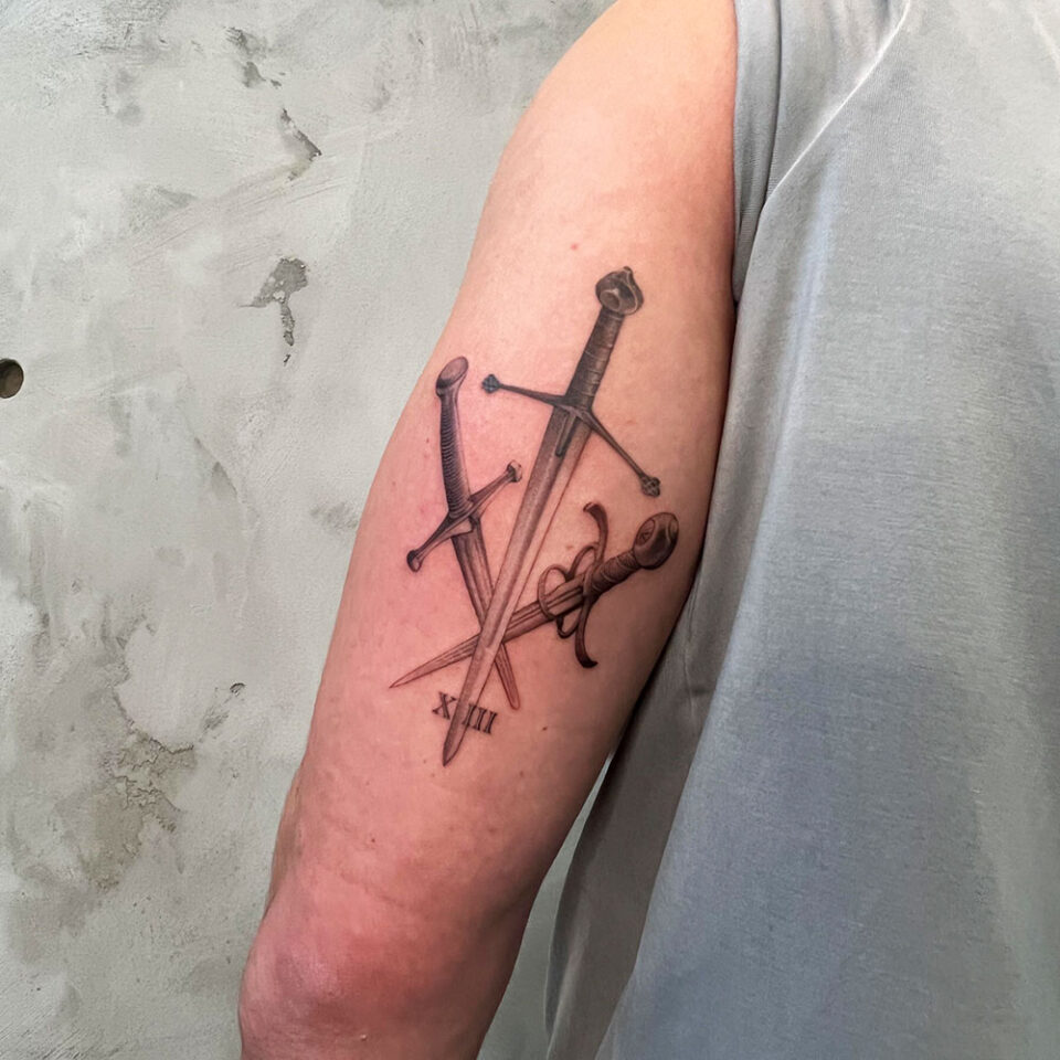 Sword and dagger tattoo Source @atelier.eva via Instagram