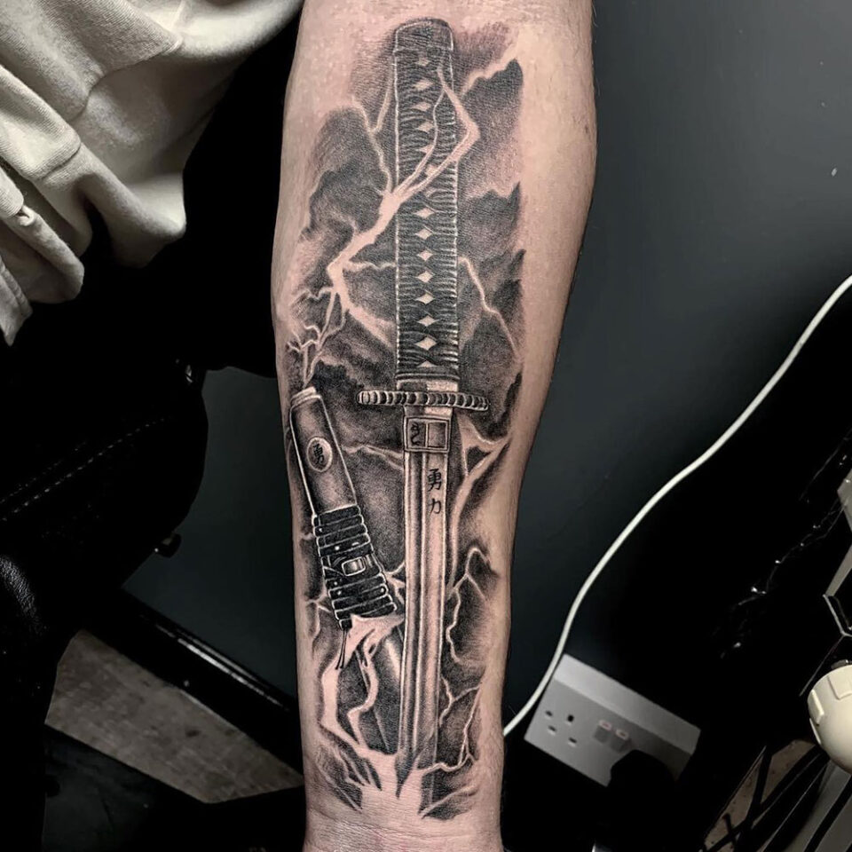 Sword and lightning tattoo Source @roguetattoowindsor via Instagram