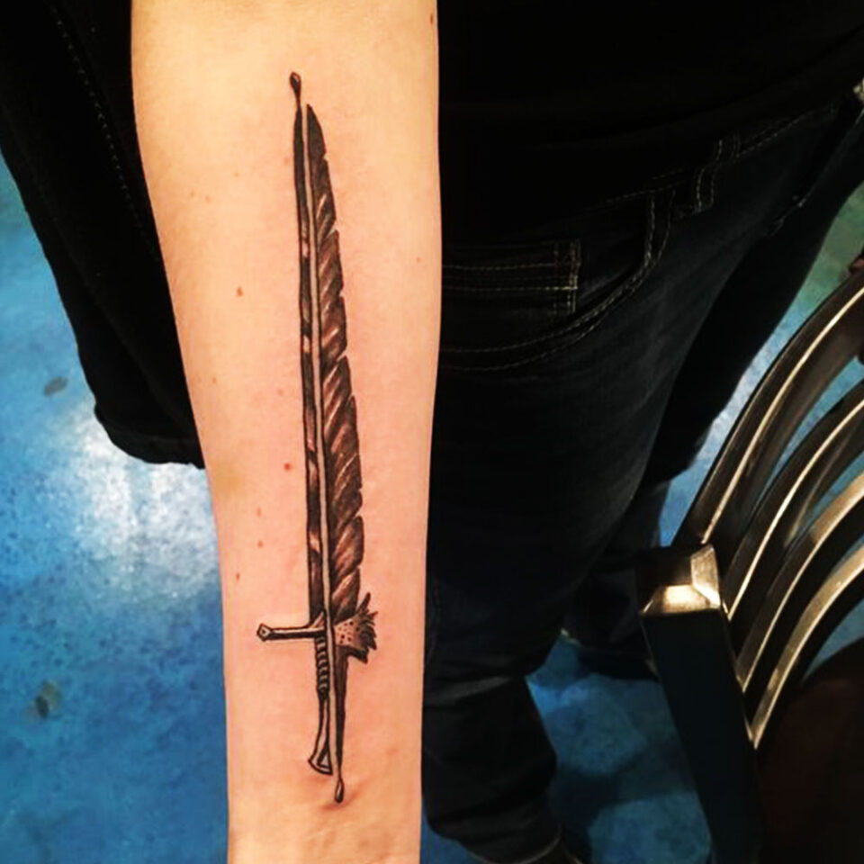Sword and quill tattoo
