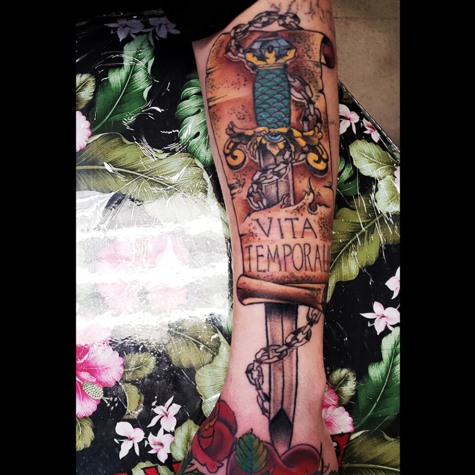 Sword and scroll tattoo Source @normandemorte via Instagram