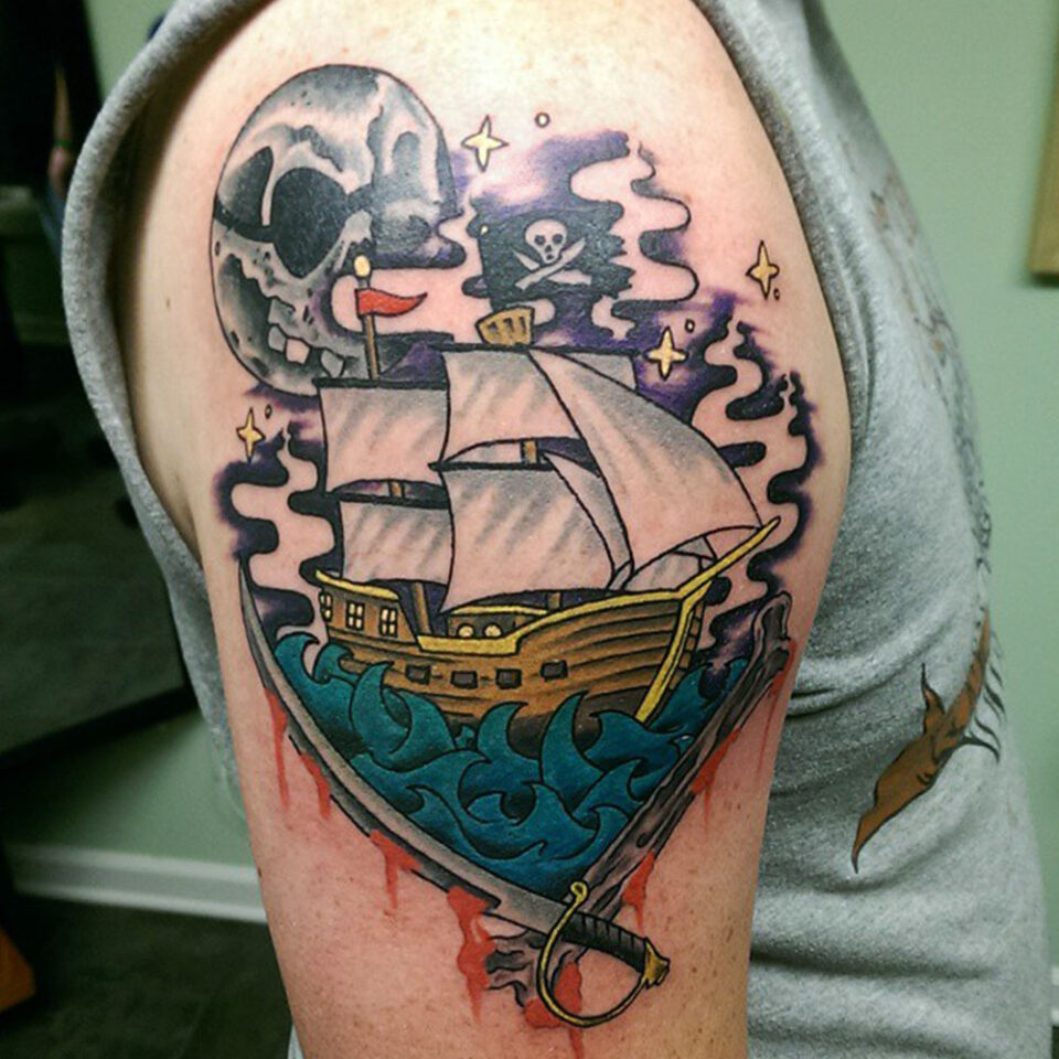 Sword and ship tattoo