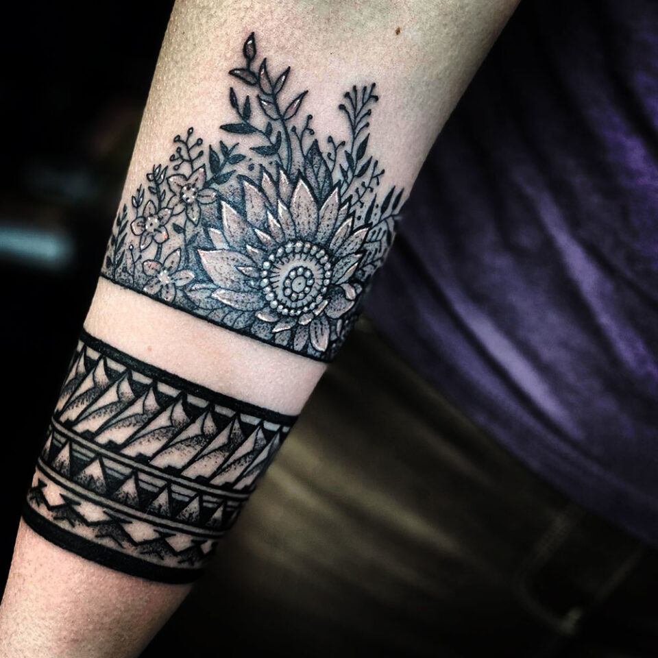 Tribal flower floral tattoo sourced via IG @studioxiiigallery