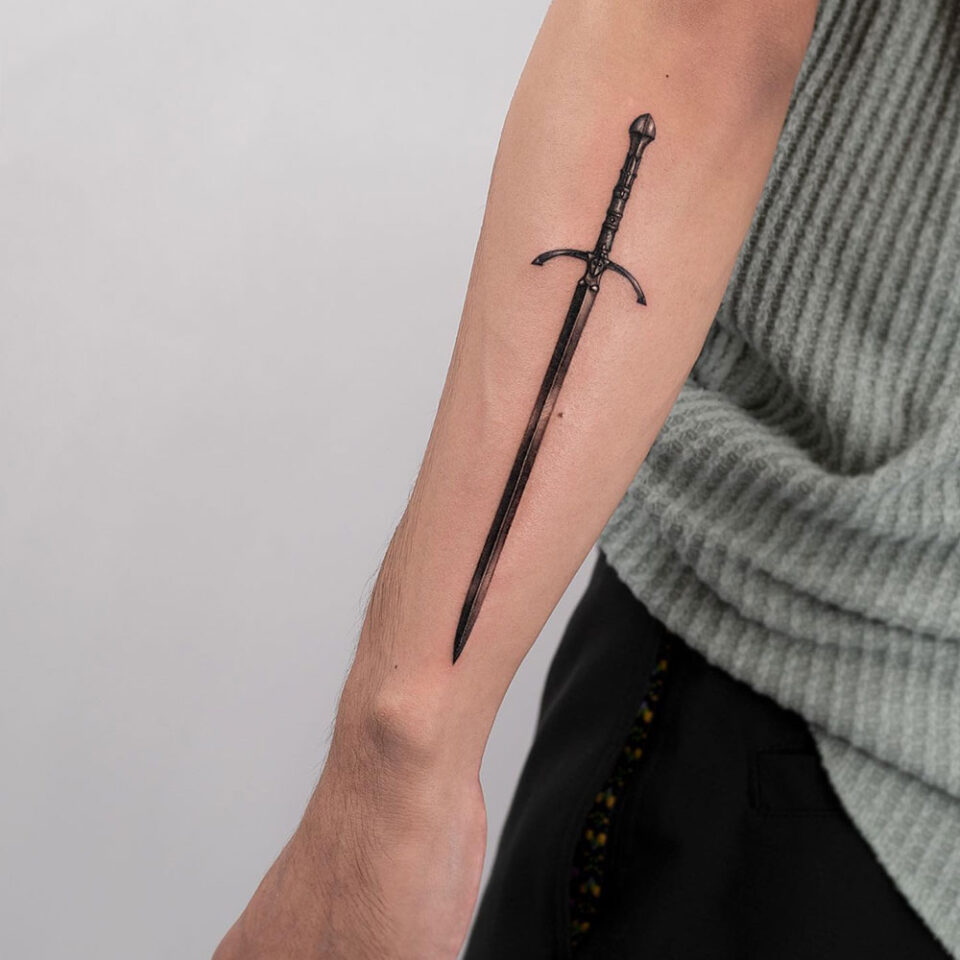 Two-handed sword tattoo Source @yuihwa____ via Instagram