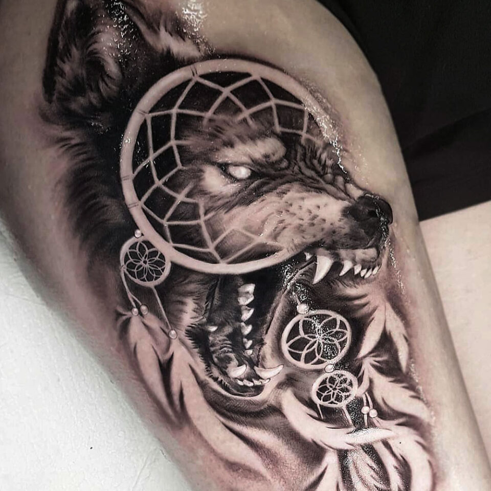 Wolf and Dreamcatcher Tattoo Source @beckysaltertattoo via Instagram
