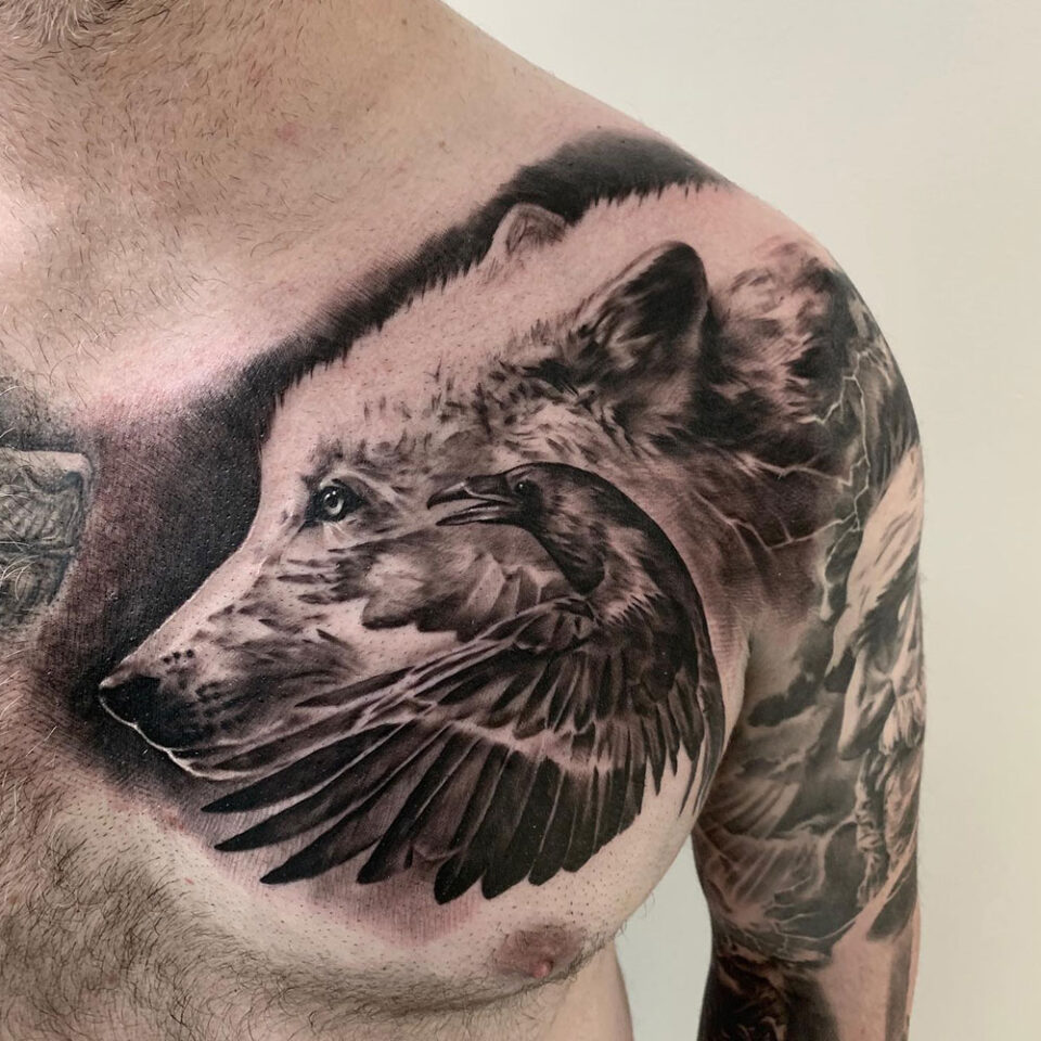 Wolf and raven Tattoo Source @matthewbrownartwork via Instagram