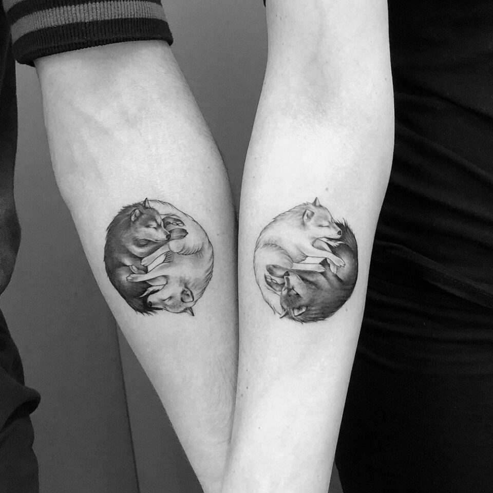 Wolf in a Circle Tattoo Source @diegomeztattoo via Instagram
