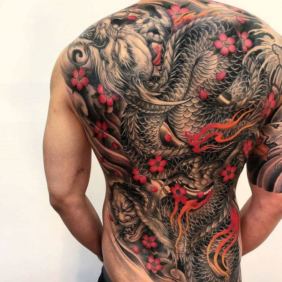 dragon and cherry blossom tattoo source @asian_inkspiration via Instagram