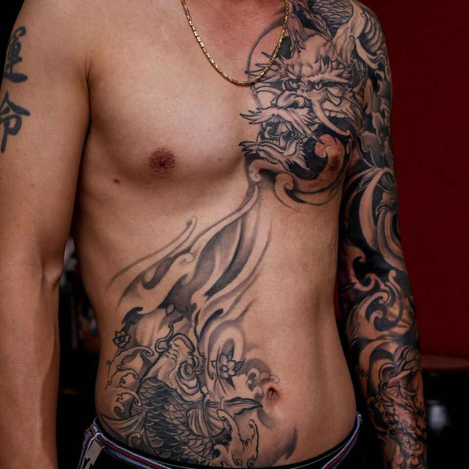 dragon and koi fish tattoo source @anhtran.tattoo via Instagram