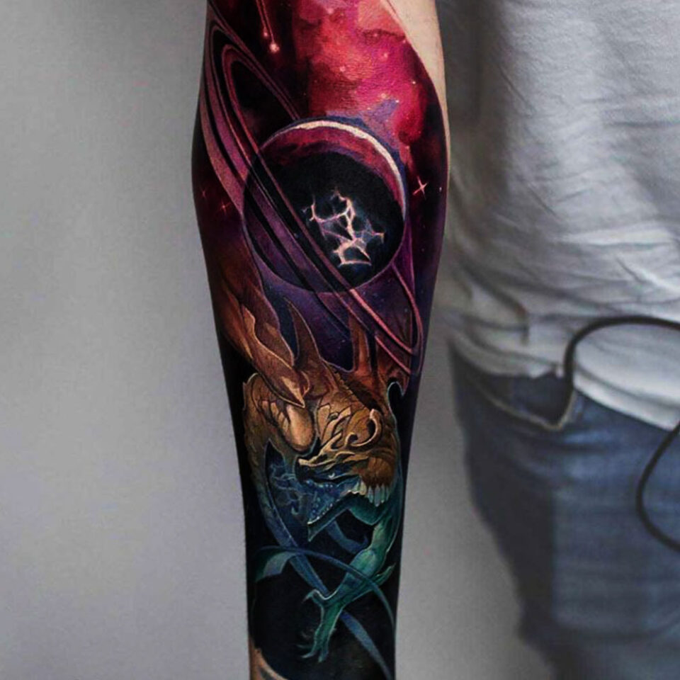 dragon and planets tattoo source @renortattoo via Instagram