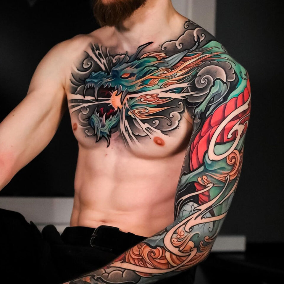 dragon and sun tattoo source @japanese.ink via Instagram