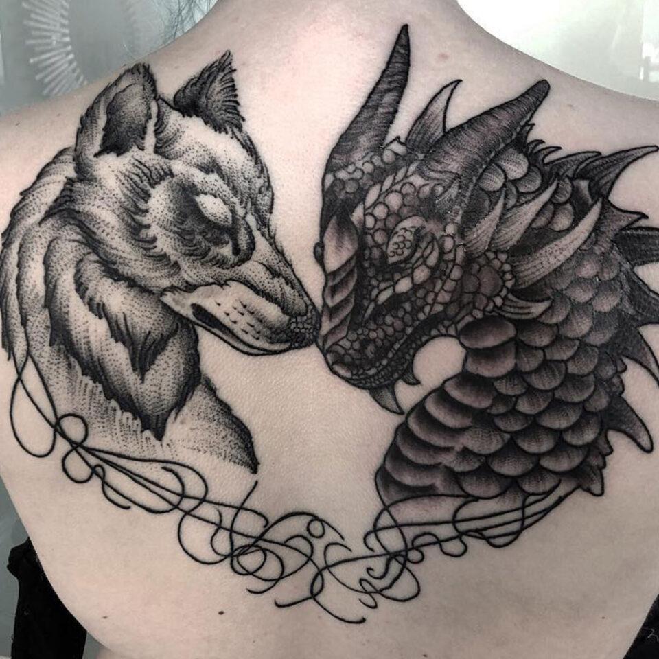 dragon and wolf tattoo source @foxintherabbithole via Instagram