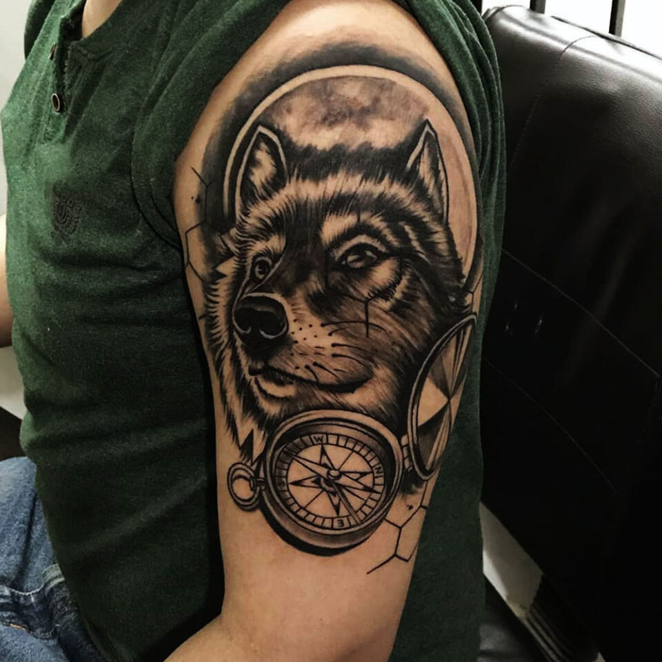 wolf and compass tattoo Source @inkdomtattooandcafe via Instagram