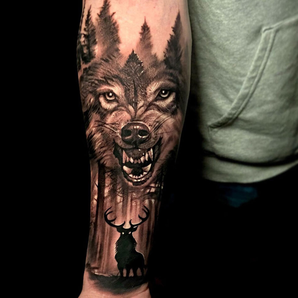 wolf and deer tattoo Source @rebelrebeltattoo via Instagram