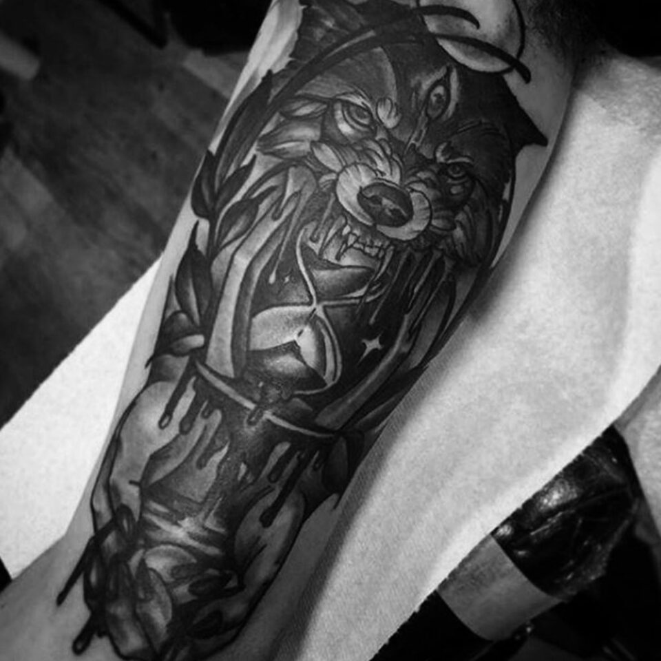 wolf and hourglass tattoo Source @hellion_art via Instagram