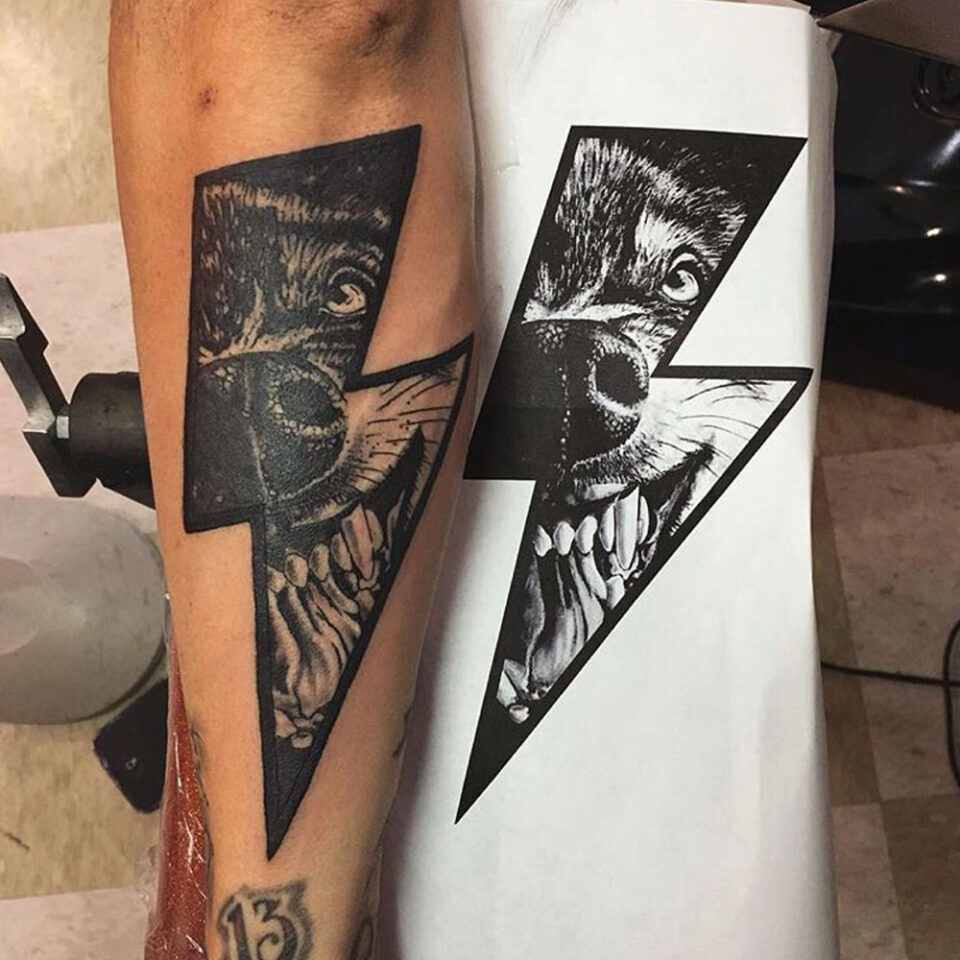 wolf and lightning bolt tattoo Source andrearevenant via Instagram