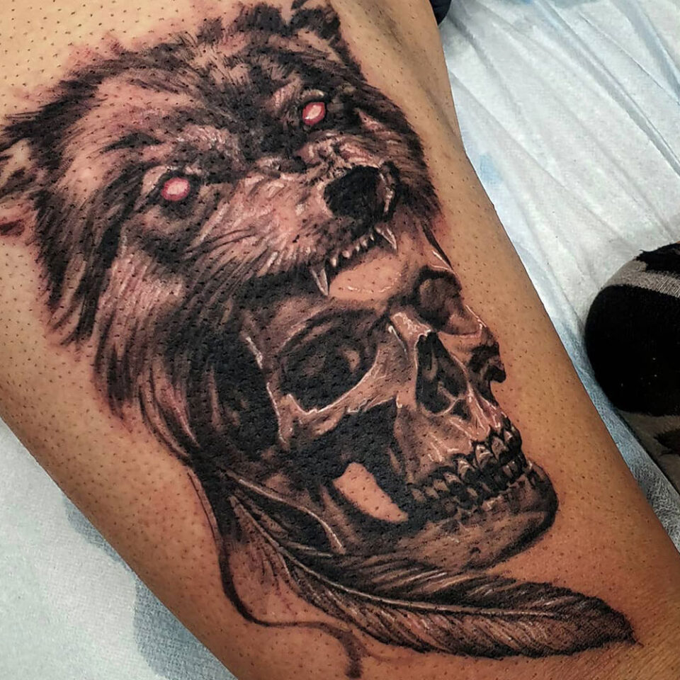 wolf and skull tattoo Source @359tattoos via Instagram