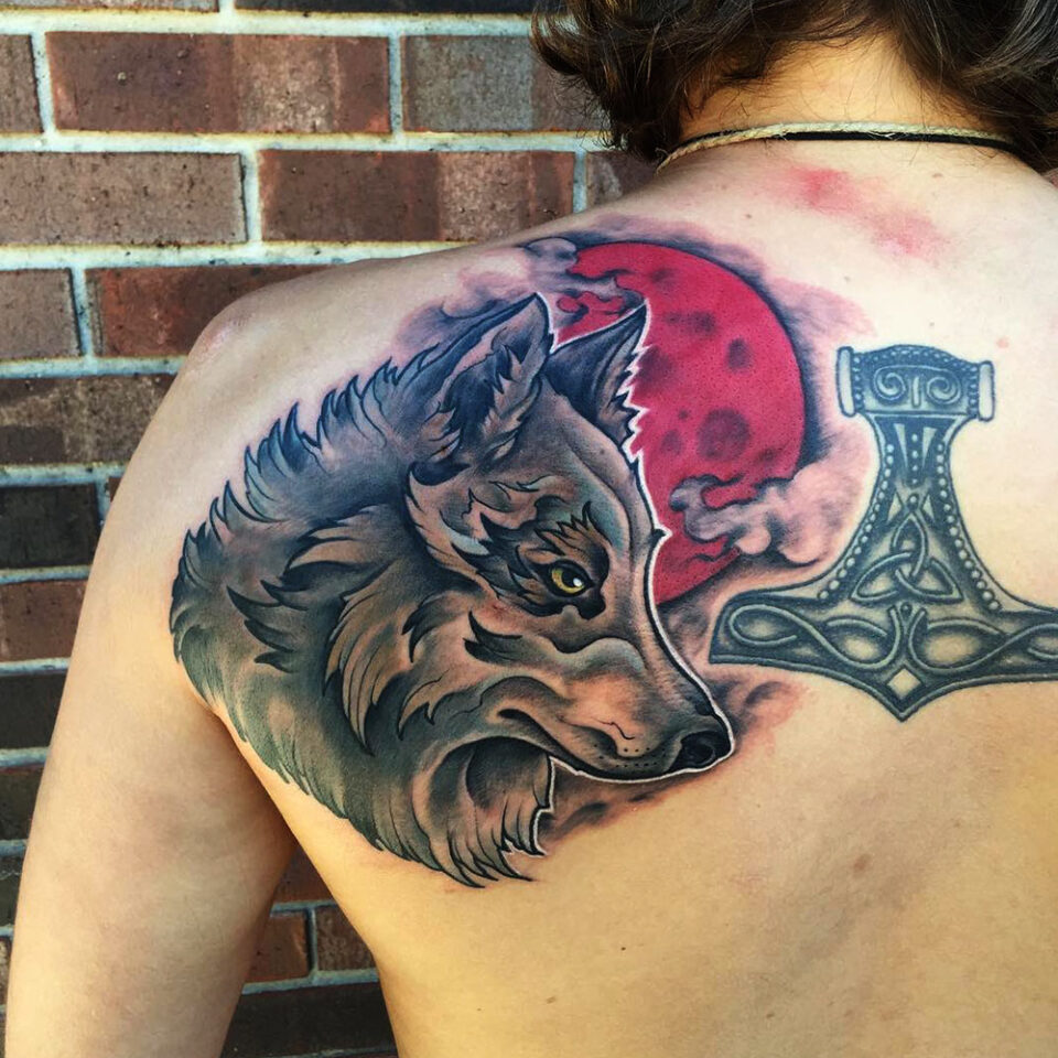 wolf with anchor tattoo