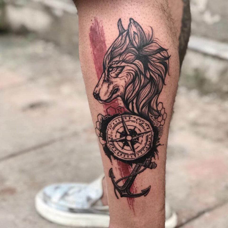 wolf with anchor tattoo Source @tattoosbymegha via Instagram