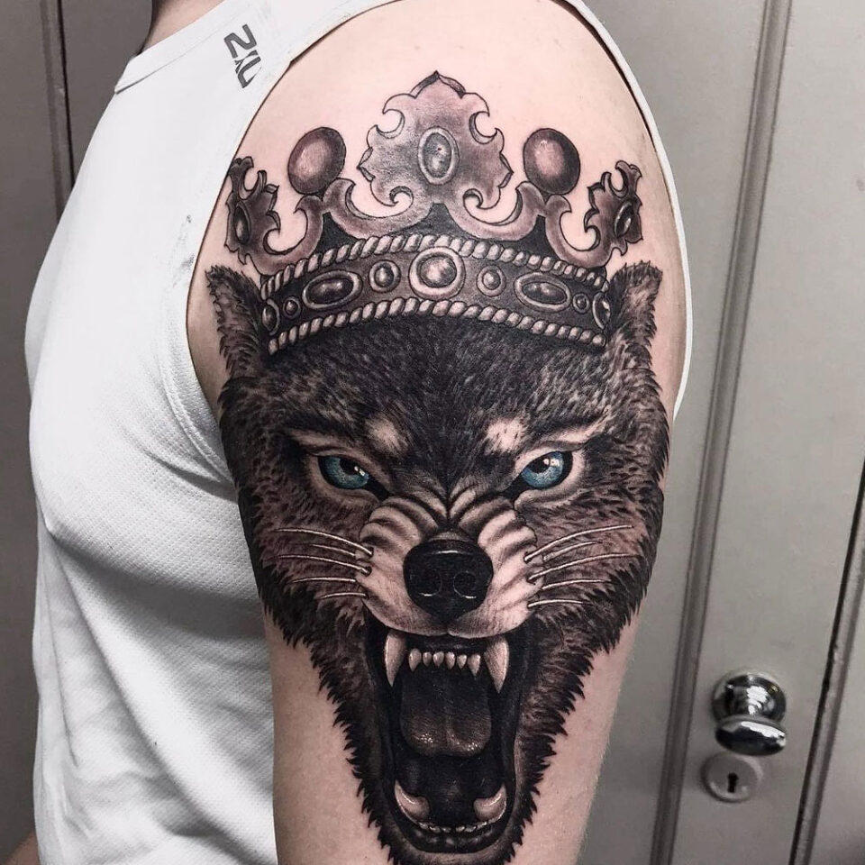 wolf with crown tattoo Source @chipbaskin via Instagram
