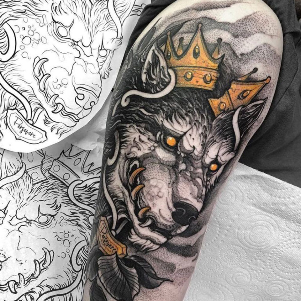 wolf with crown tattoo Source @killerinktattoo via Instagram