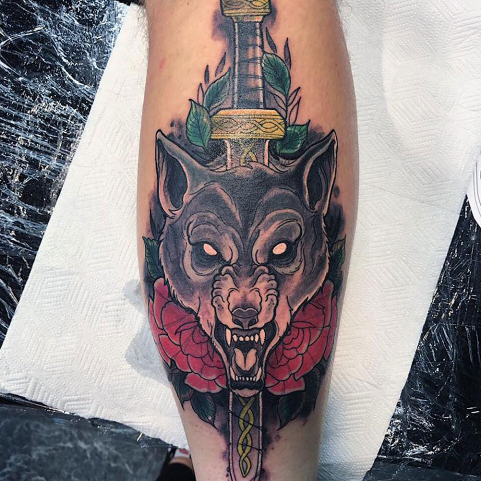 wolf with sword tattoo Source @broken_serpent_tattoo via Instagram