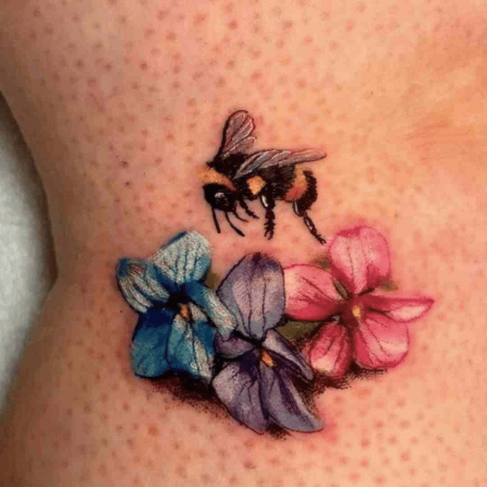 Bee On Honeysuckle Tattoo Source @tattoostylist.com