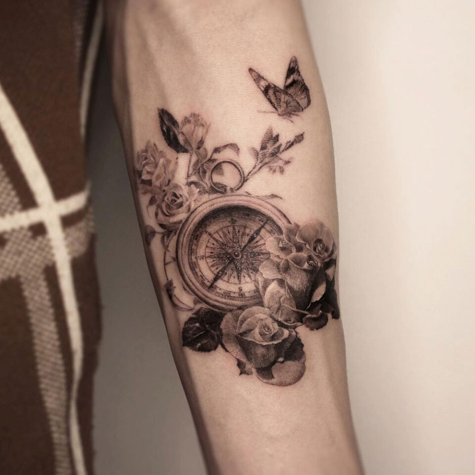 Compass with Climbing Rose Vines Tattoo Source @goun_bng via Instagram