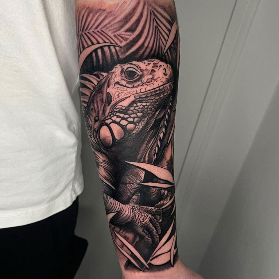 Iguana on a Branch Pet Tattoo Source @pawel.inkdistrict via Instagram