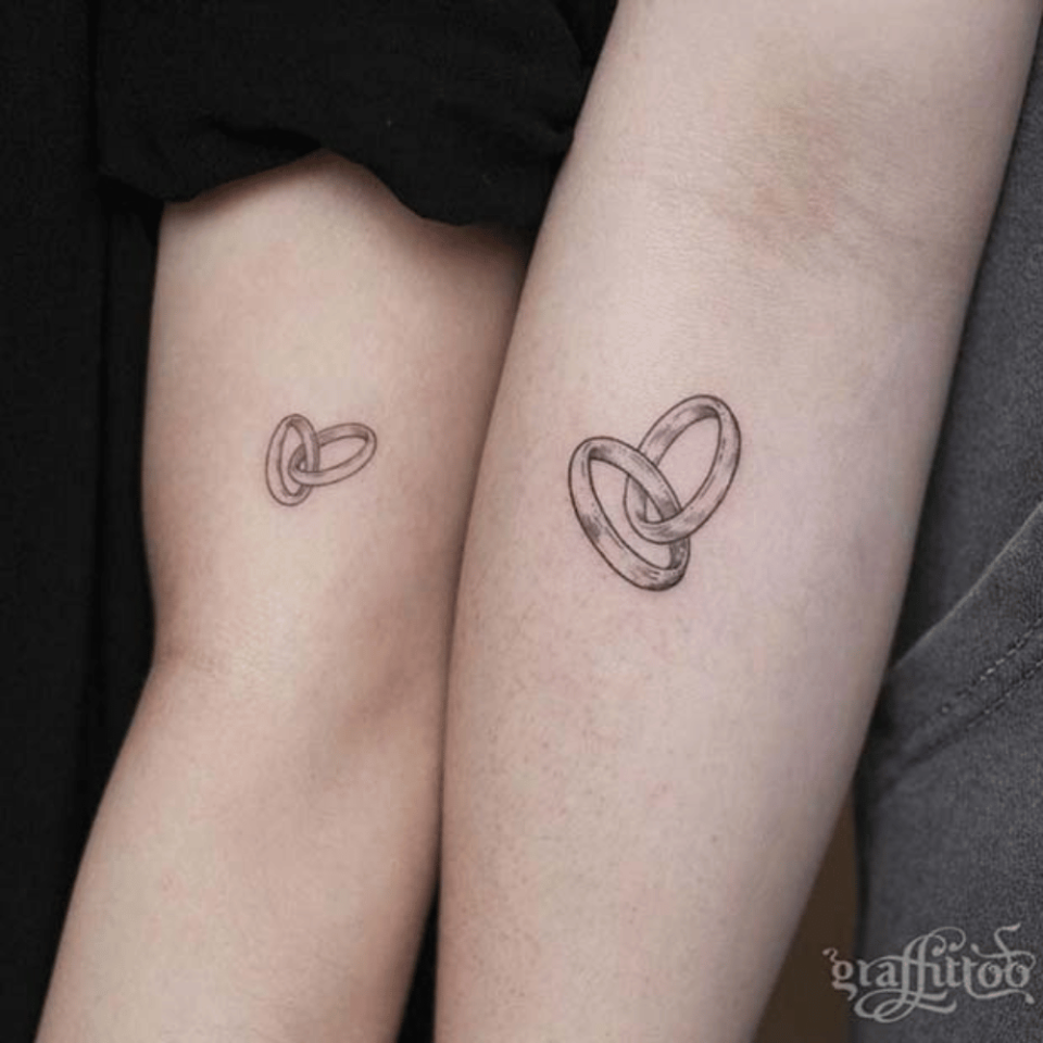 Interlocking Rings Matching Tattoo Source @graffittoo via Instagram