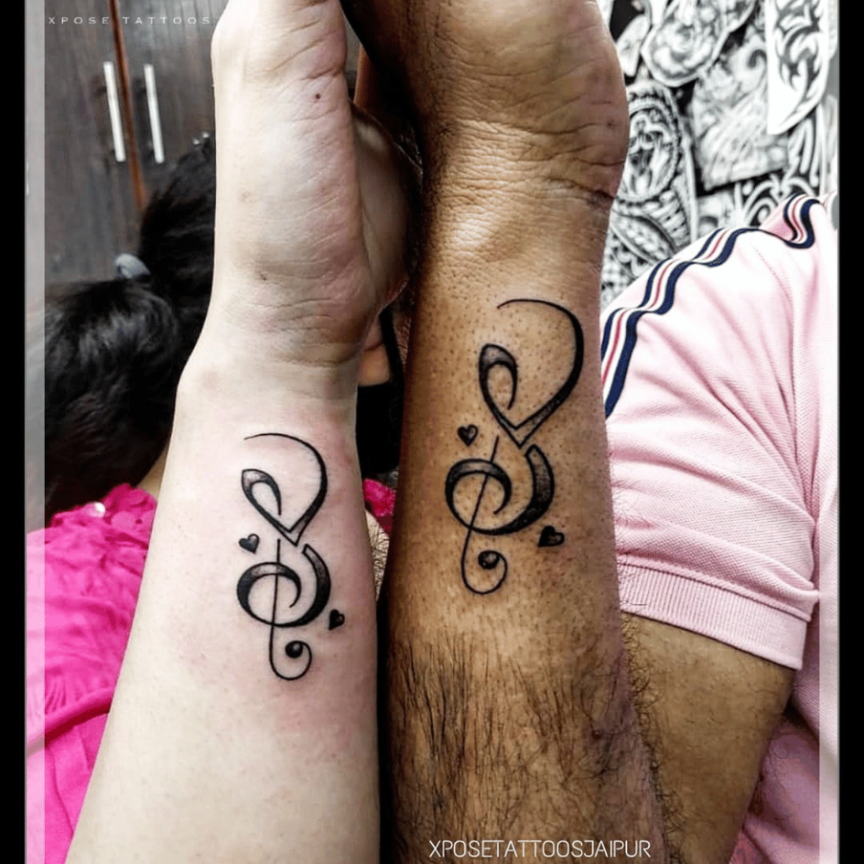 Musical Staff Matching Tattoo Source @XposeTattoosJaipur via Facebook