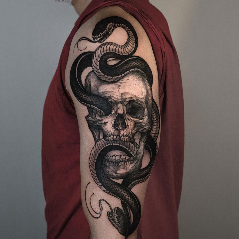 Python in a Skull Pet Tattoo Source @inkaddictapparel Instagram