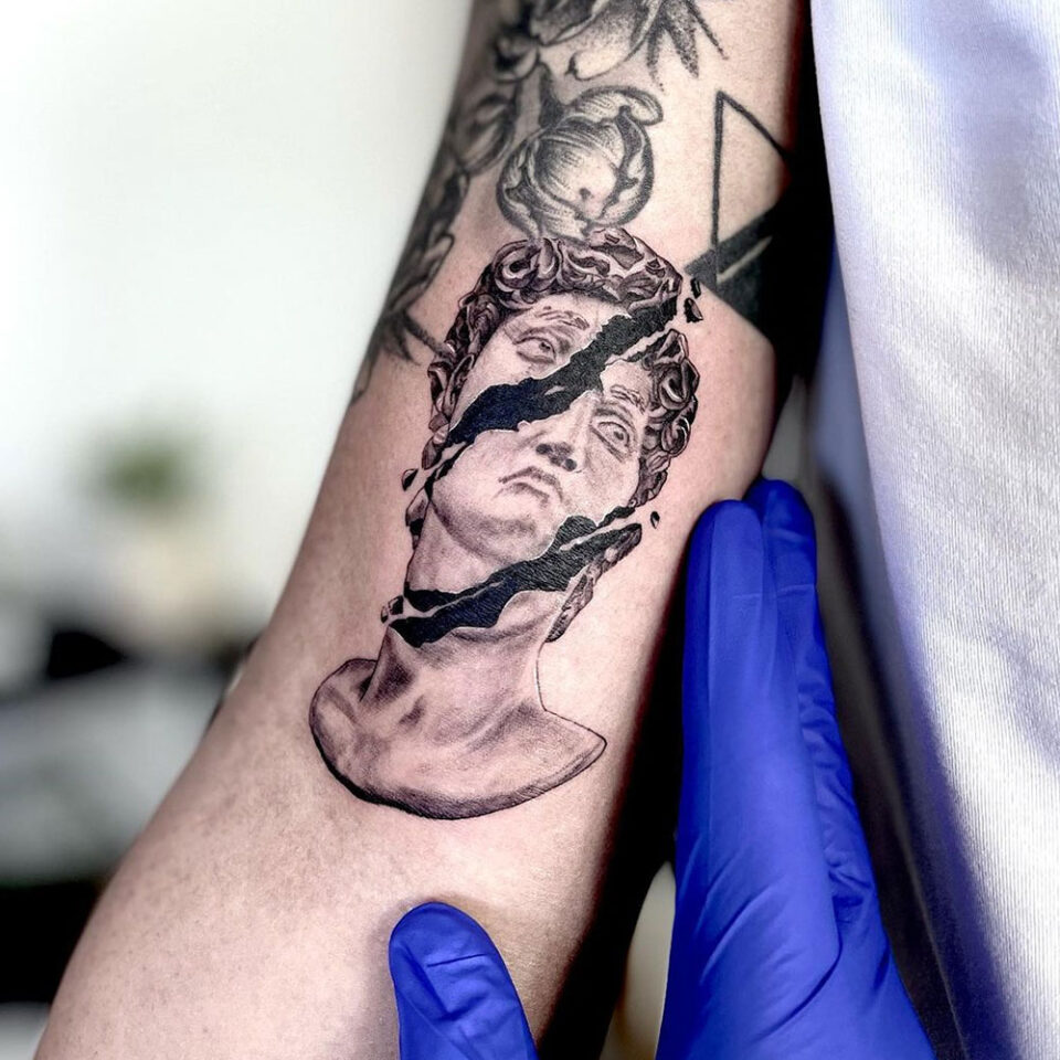 Renaissance sculpture portrait tattoo Source @creativewolftattoo via Instagram