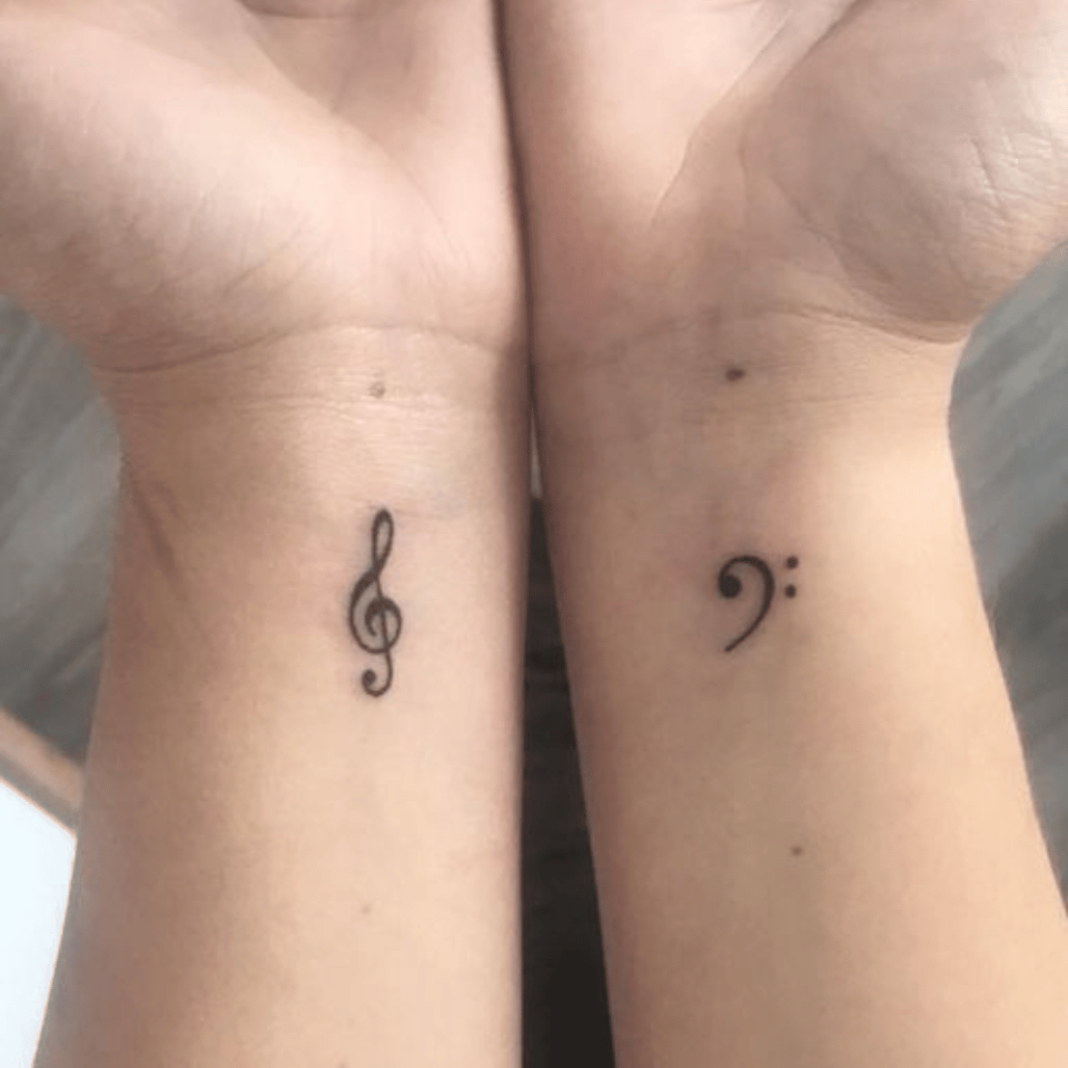 Treble Clef and Bass Clef Matching Tattoo @blackwidowtattoomalta via Facebook