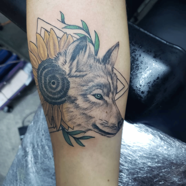 Tribal Wolf Sunflower Tattoo Source Sayad Tattoo Arts via Facebook