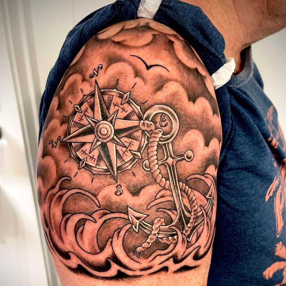compass with anchor tattoo Source @lovetattoossandhurst via Instagram