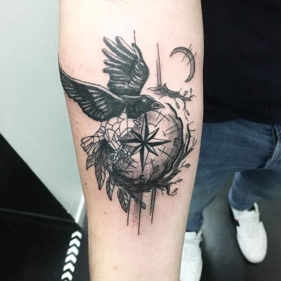 compass with bird in flight tattoo Source JONwhitekrakentattoo via Facebook