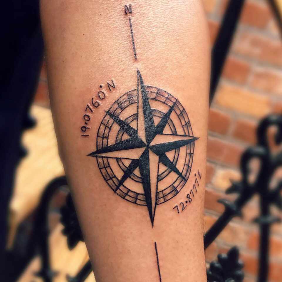 compass with coordinates tattoo Source @zero3_tattoo_studio via Instagram