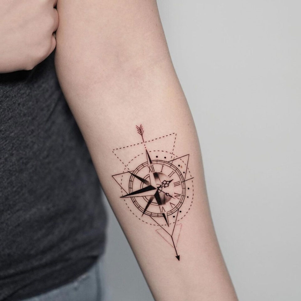 compass with geometric tattoo Source @blindreasontattoo via Instagram
