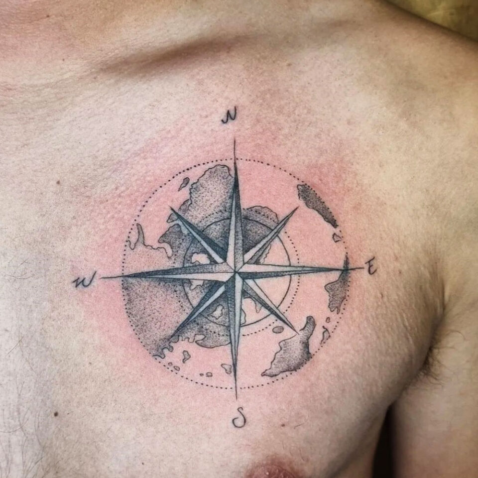 compass with globe tattoo Source @mayr_inkedsalem via Instagram