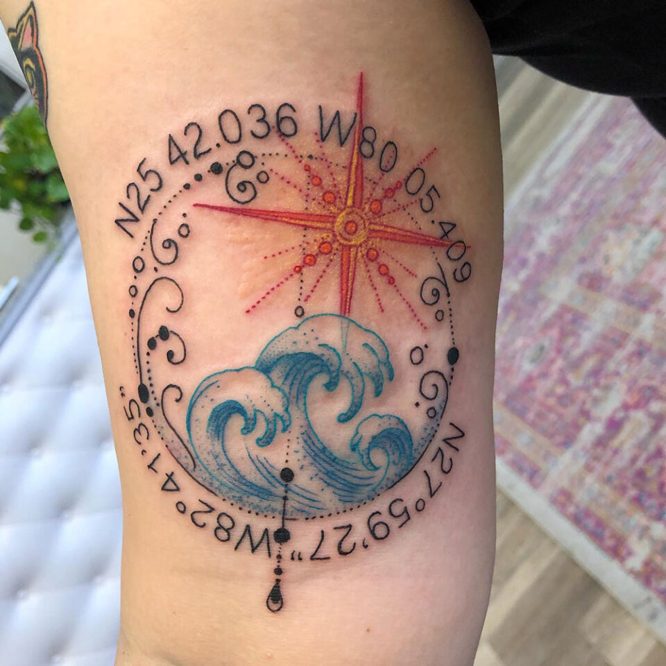 compass with ocean waves tattoo Source @monumenttattoos via Instagram