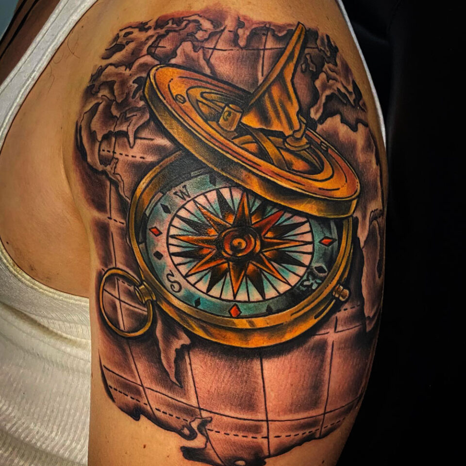 compass with sun dial tattoo Source @GenesisTattoo2212 via Facebook