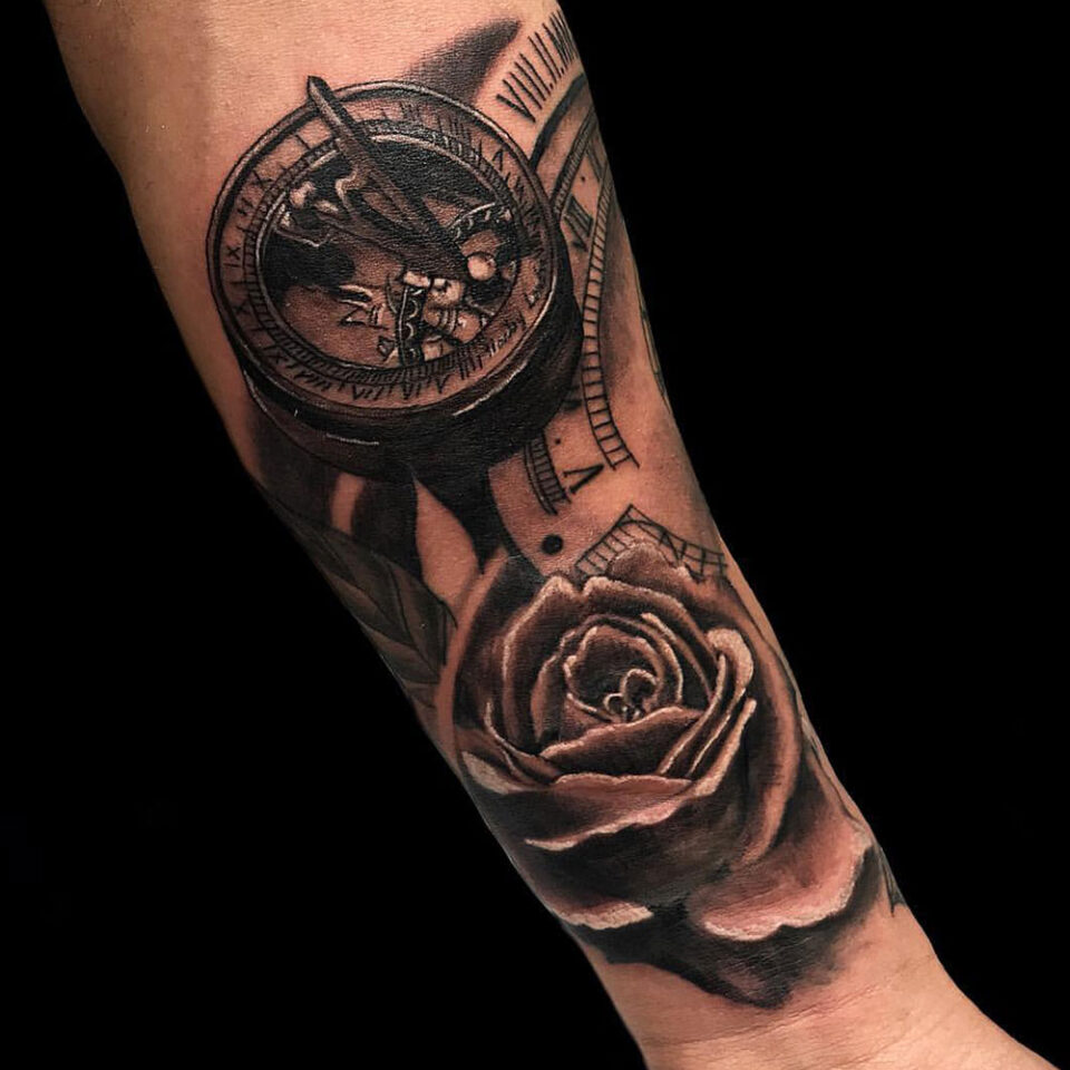 compass with sun dial tattoo Source @jimtran_ via Instagram